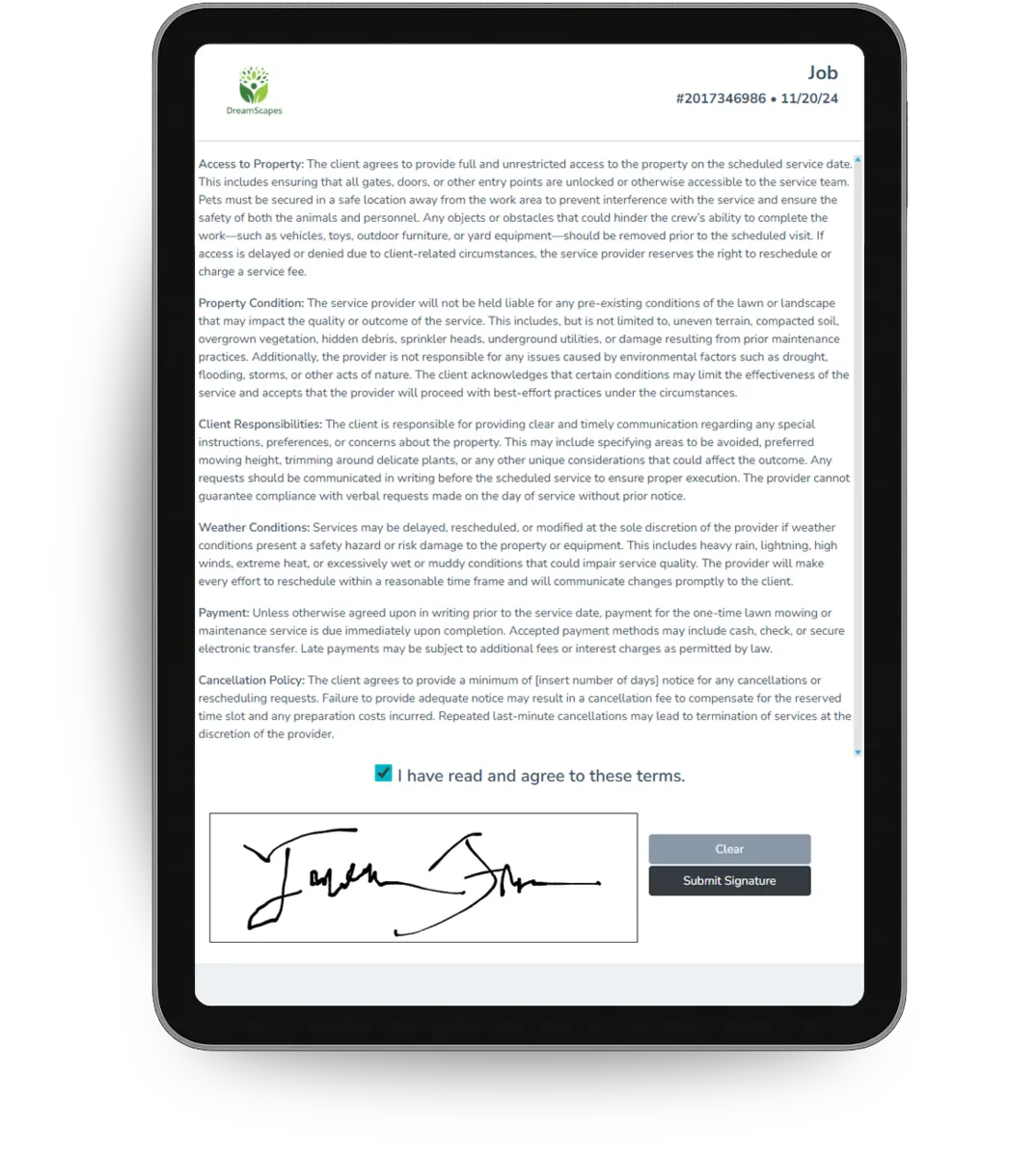 A tablet showing a signed agreement with the customer signature